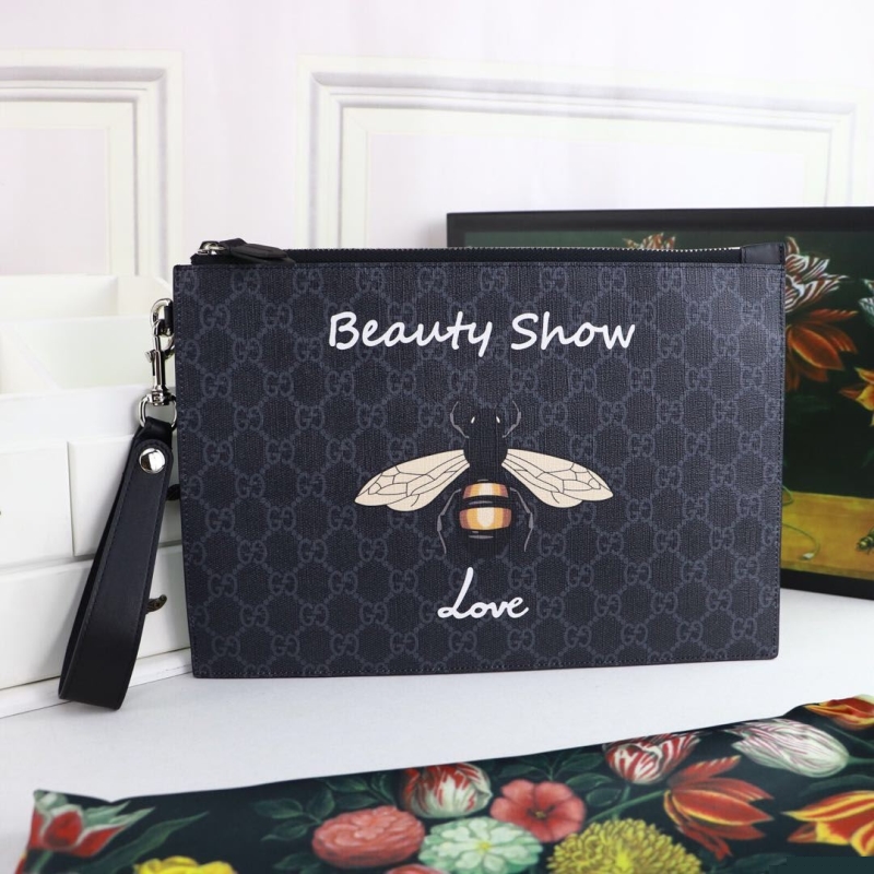 G*u*i clutch bags